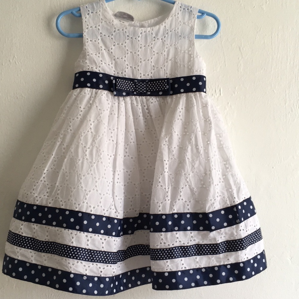 White formal dress with polka dot details